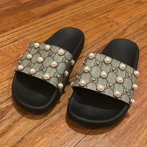 Guccis special edition slides in new condition